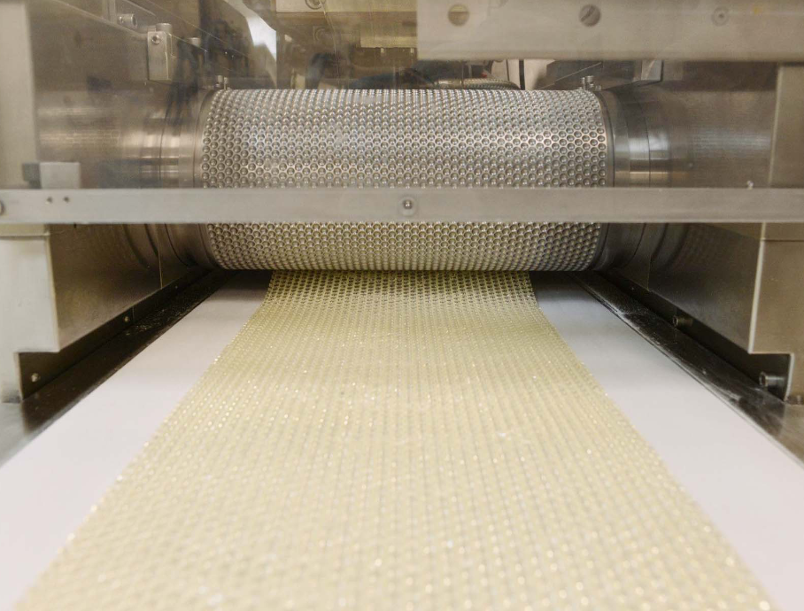 image of a hot melt extrusion manufacturing process line